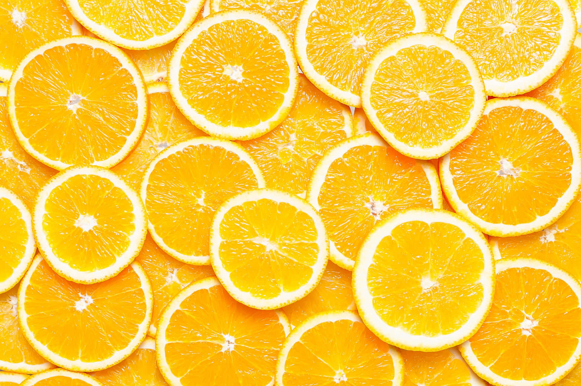 Vibrant Orange Citrus Slices Background Background