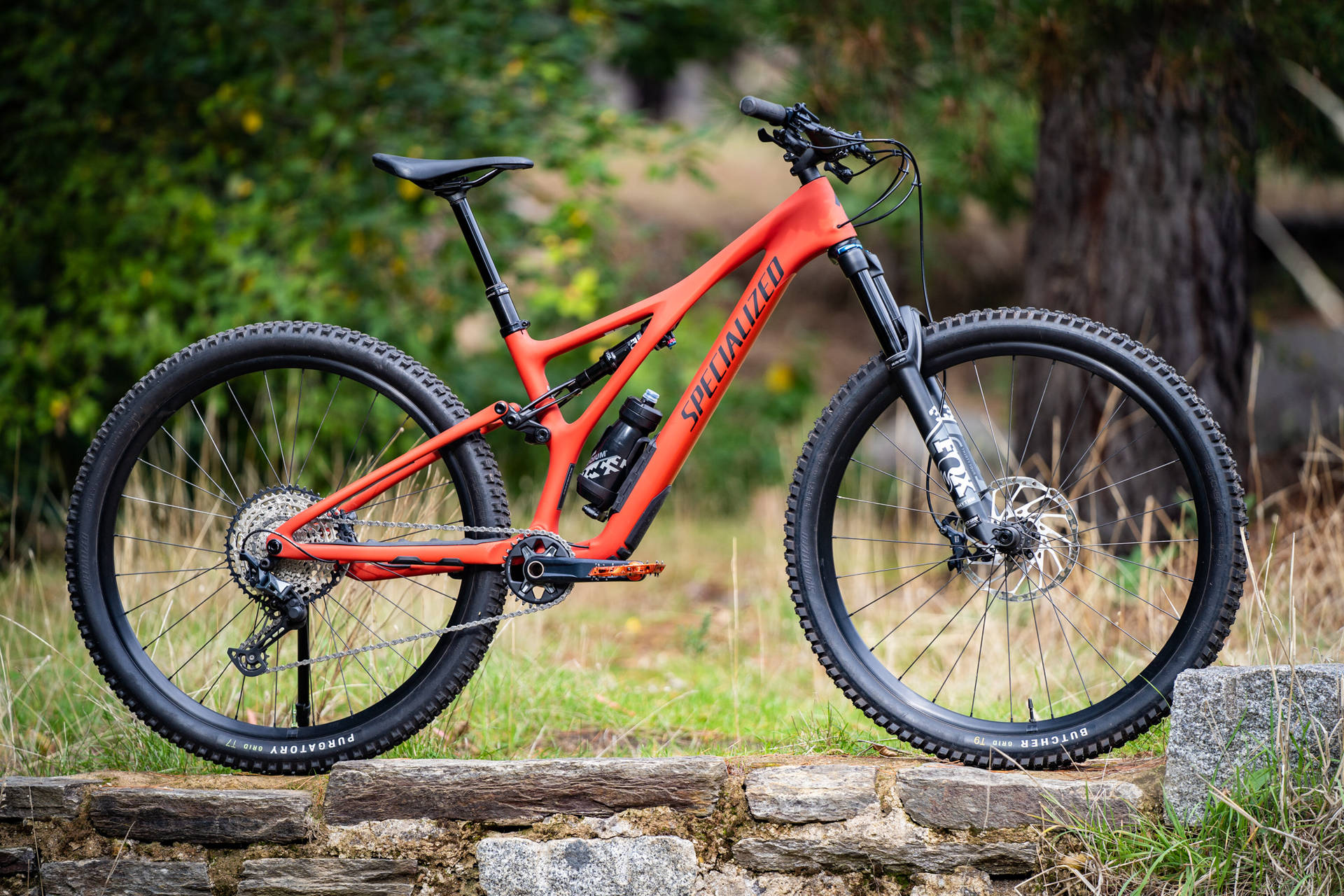 Vibrant Orange Specialized Bike In The Great Outdoors Background