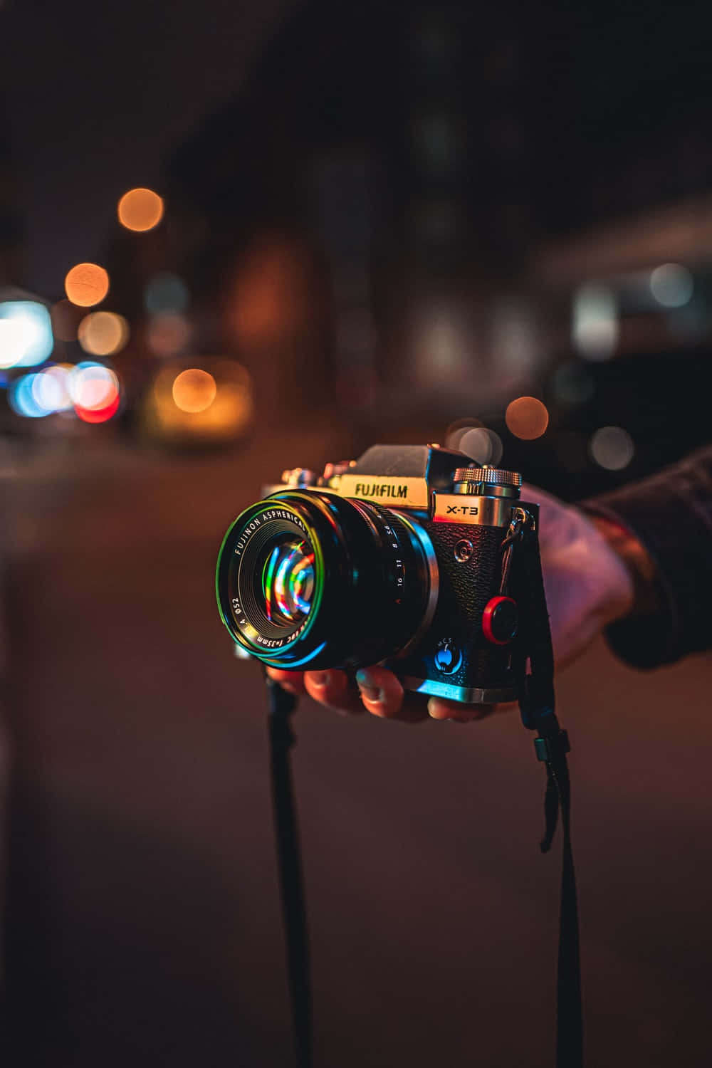 Vibrant Photography Passion: A Camera On A Colorful Street Background