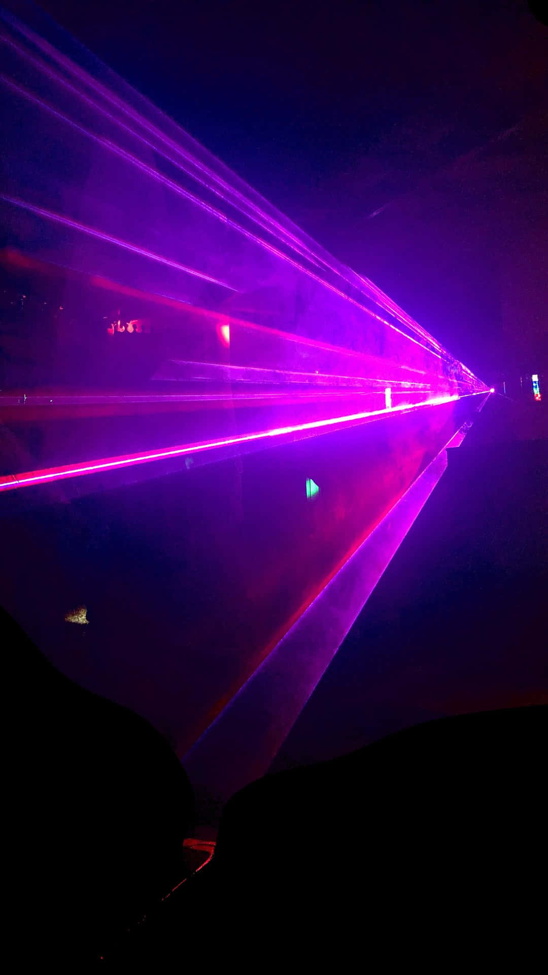 Vibrant Purple Laser Beams Night Background
