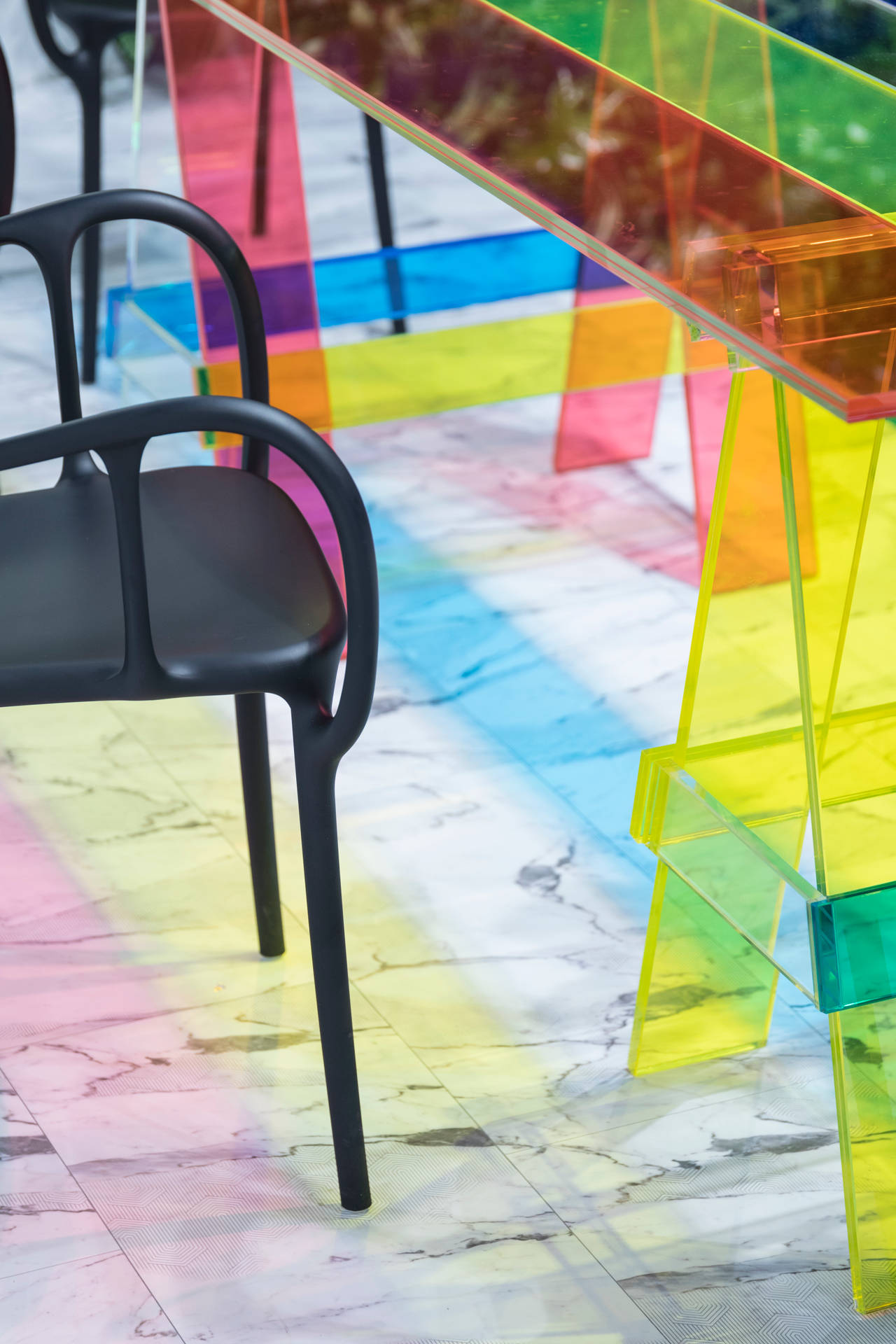 Vibrant Rainbow Stripes On Glass Table Background