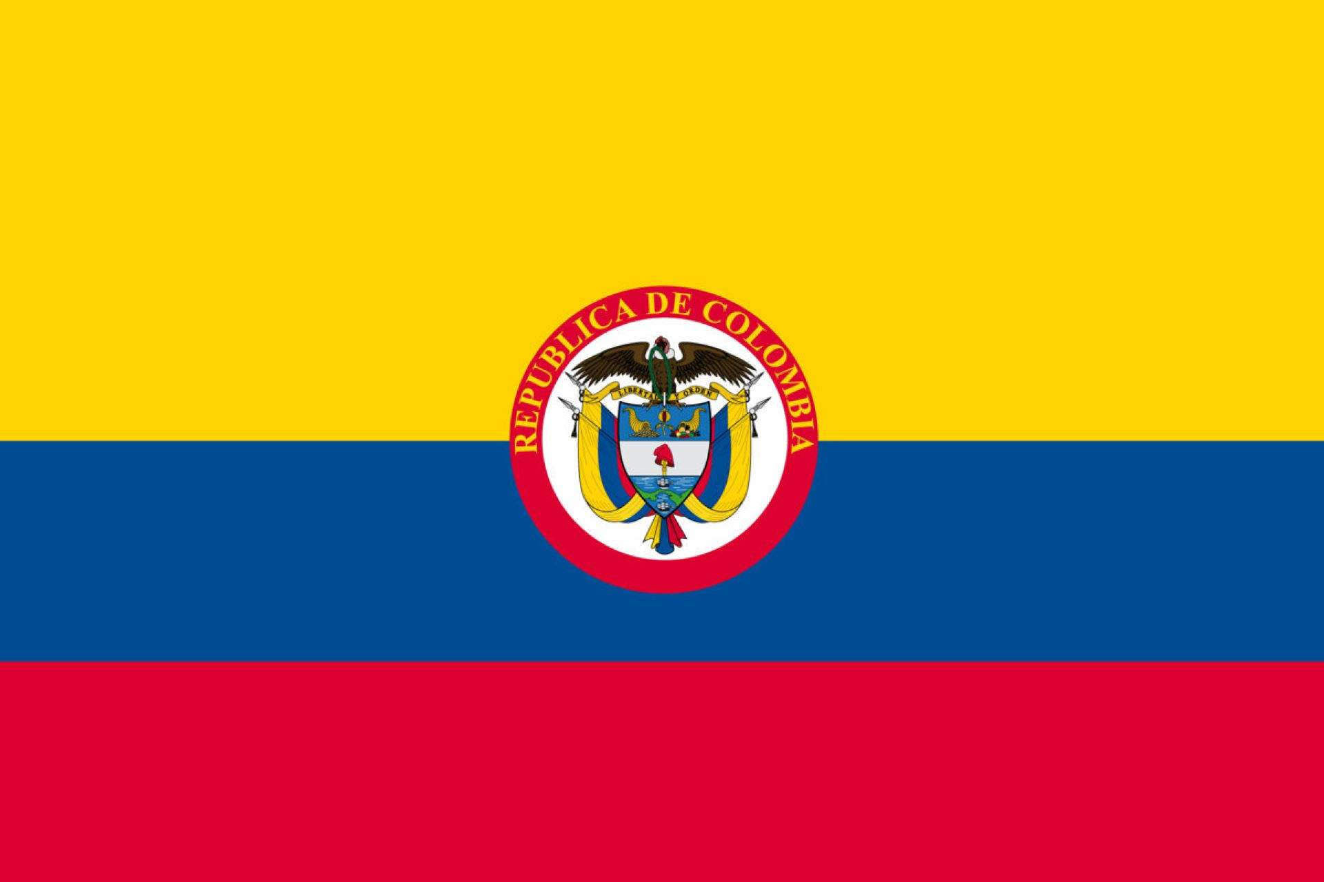 Vibrant Republic Of Colombia Flag Waving In The Air Background
