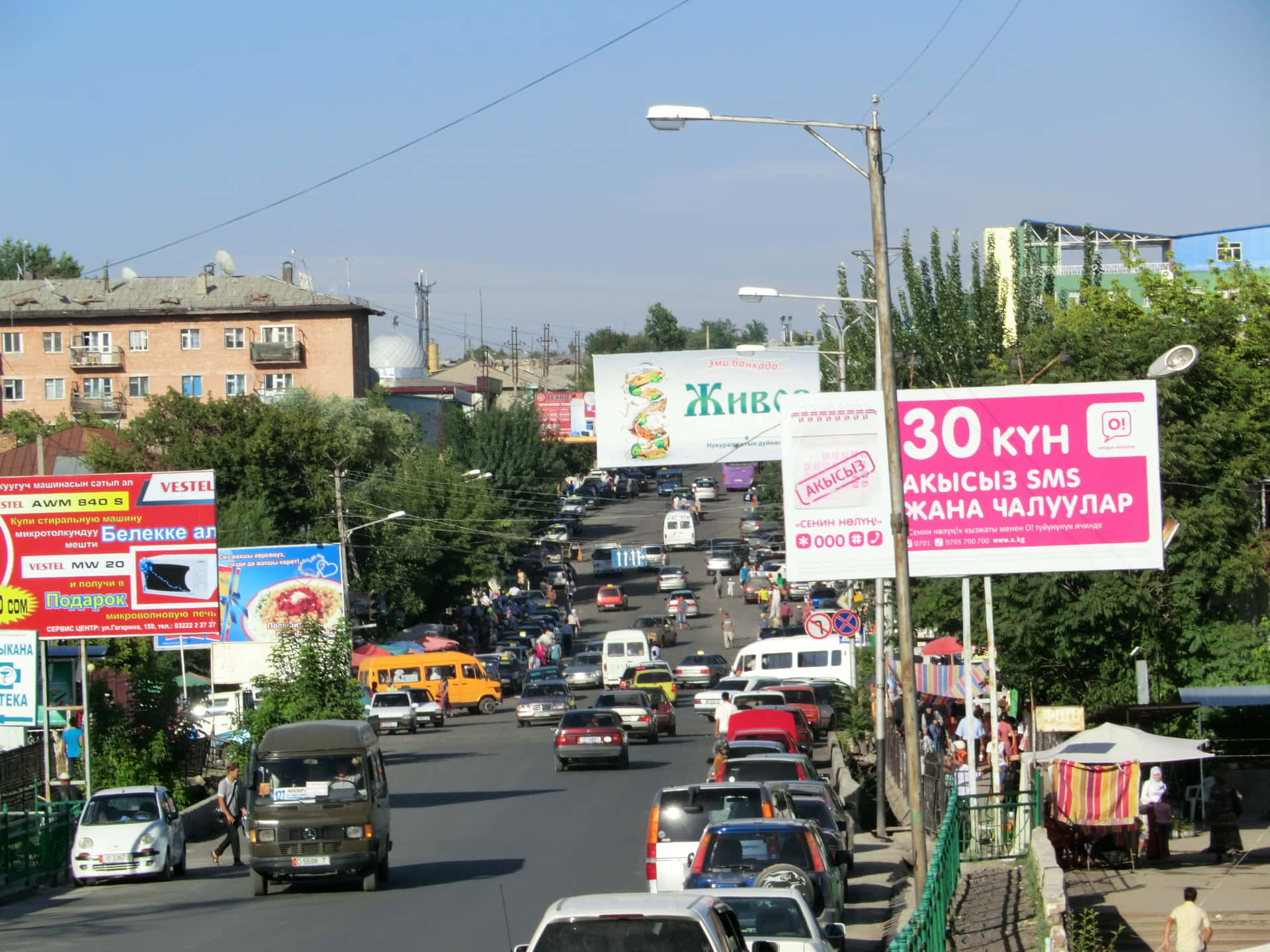 Vibrant Street Life In Osh City