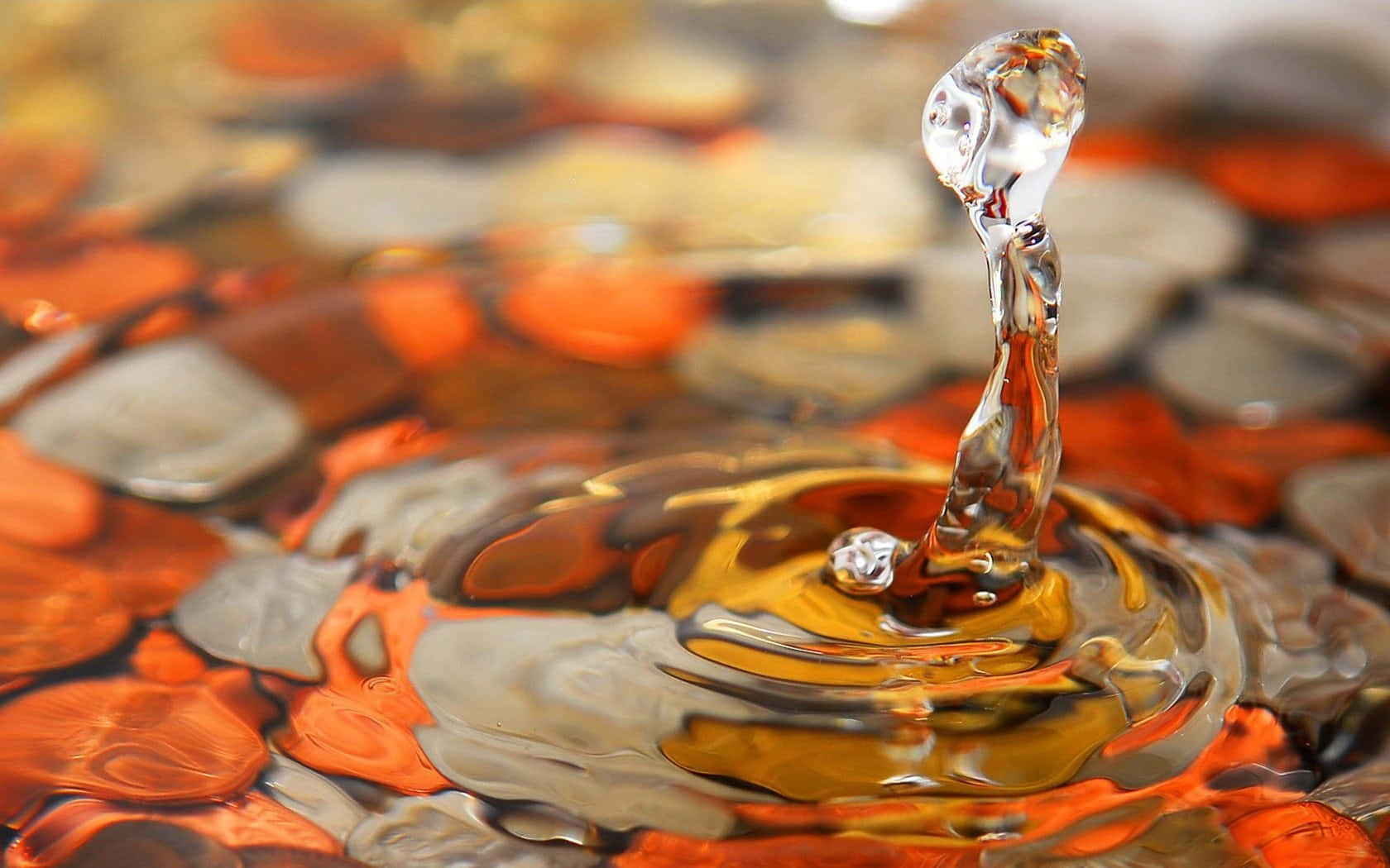 Vibrant_ Water_ Drop_ Splash_ Desktop_ Background.jpg Background