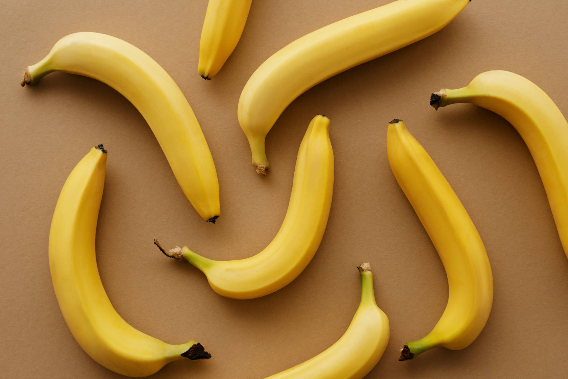 Vibrant Yellow Bananas In Disarray Background