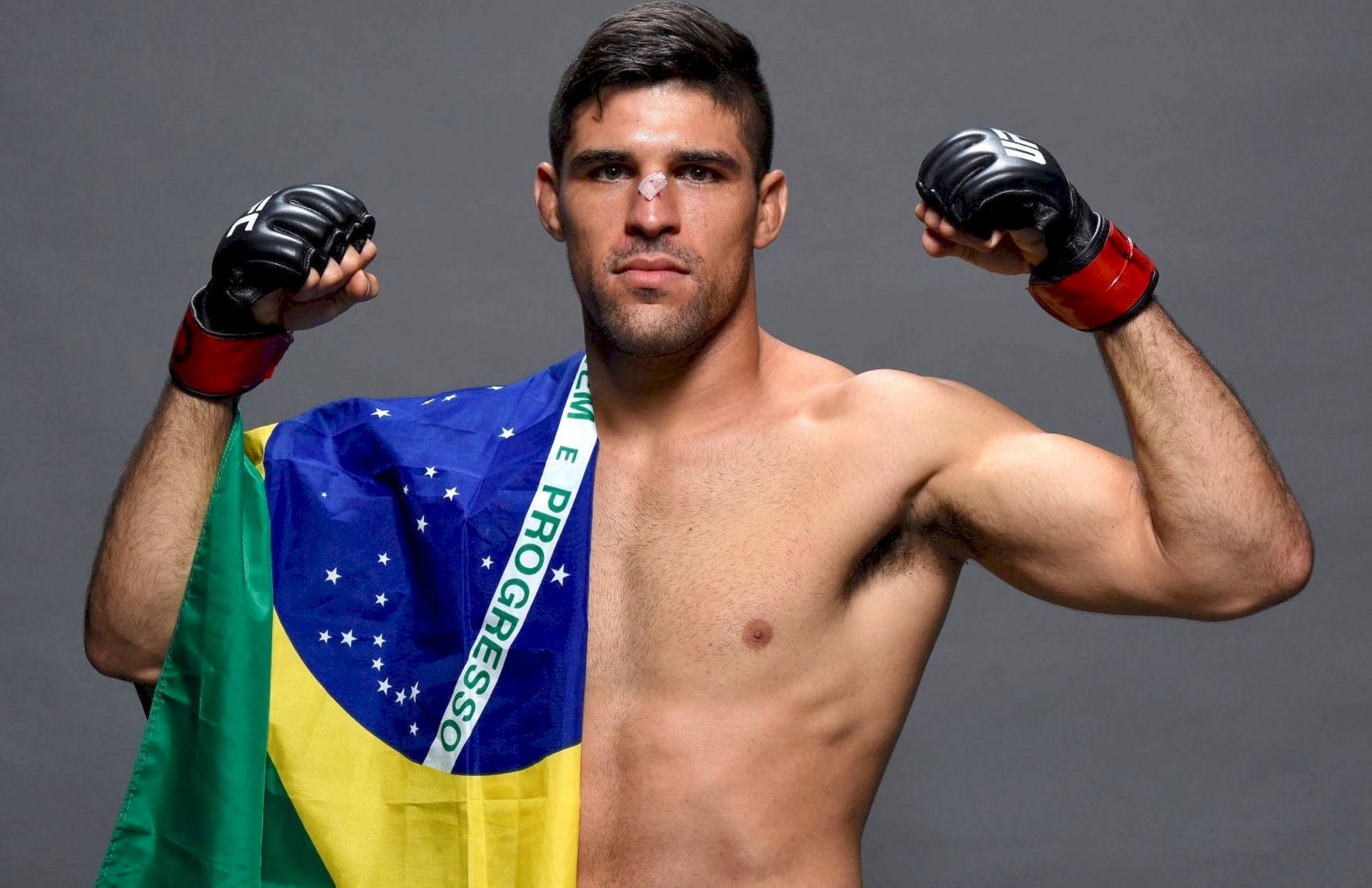 Vicente Luque Posing With Brazilian Flag Background