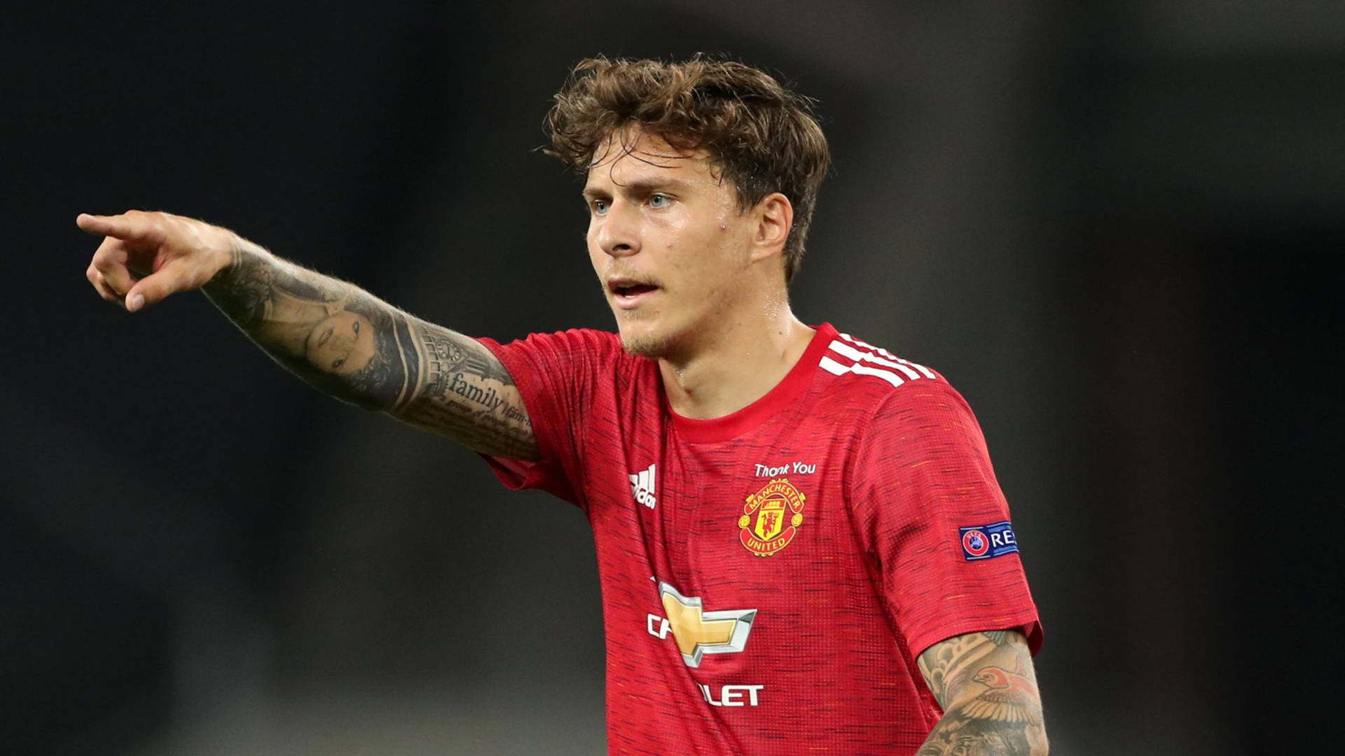 Victor Lindelof In Action During A Football Match Background