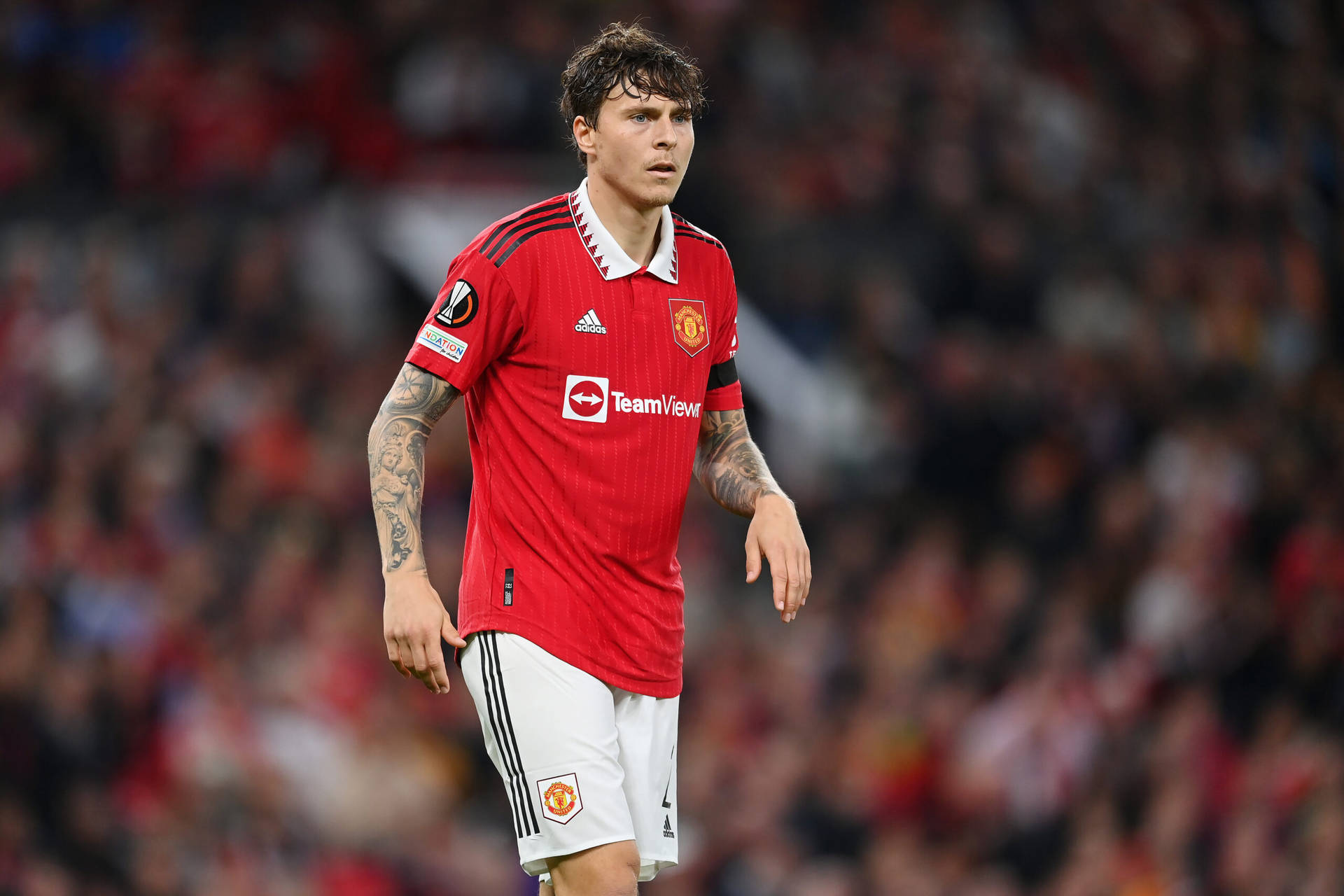 Victor Lindelof In Action On Football Field Background