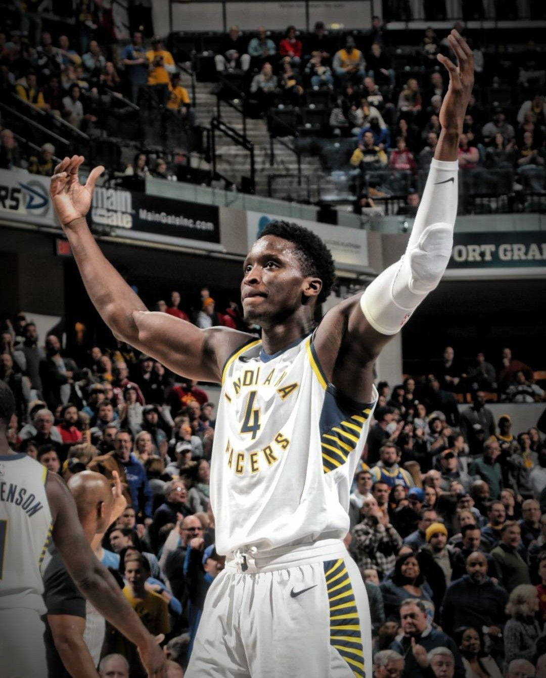 Victor Oladipo While Raising Both Hands Background