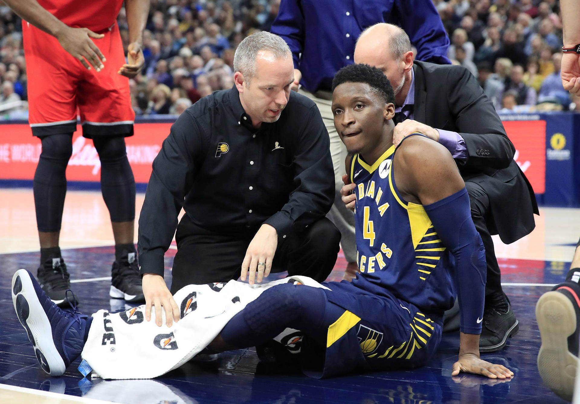 Victor Oladipo With Coach And Referee