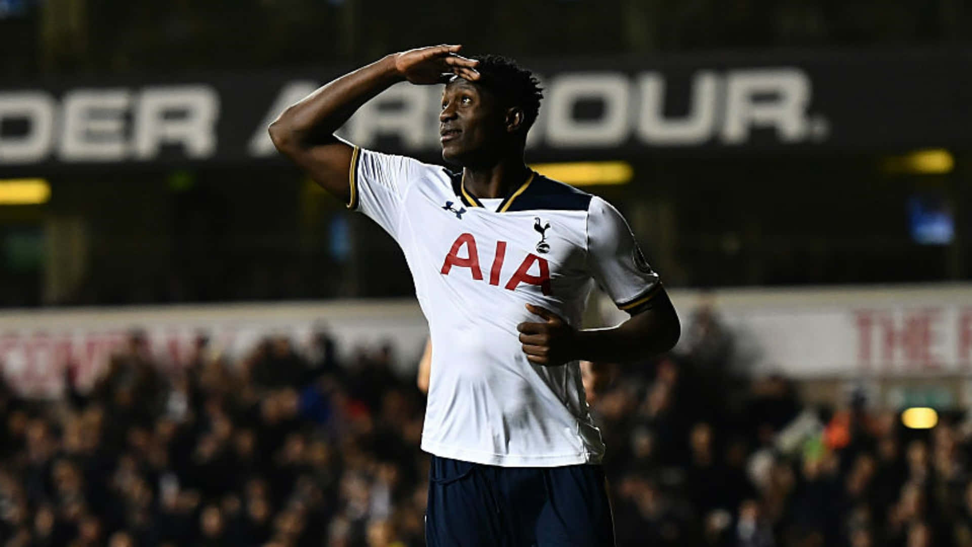 Victor Wanyama Celebrating A Scored Goal In A Match Background