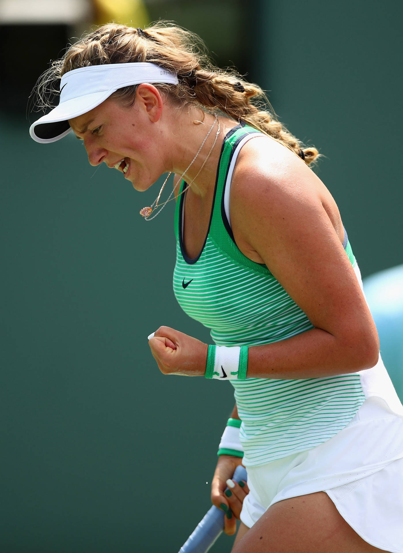 Victoria Azarenka Fist Pump In Green Background