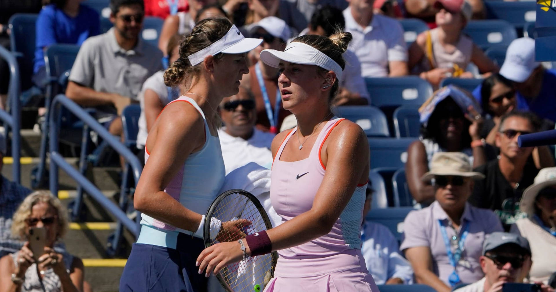 Victoria Azarenka In Pink With Racket Background