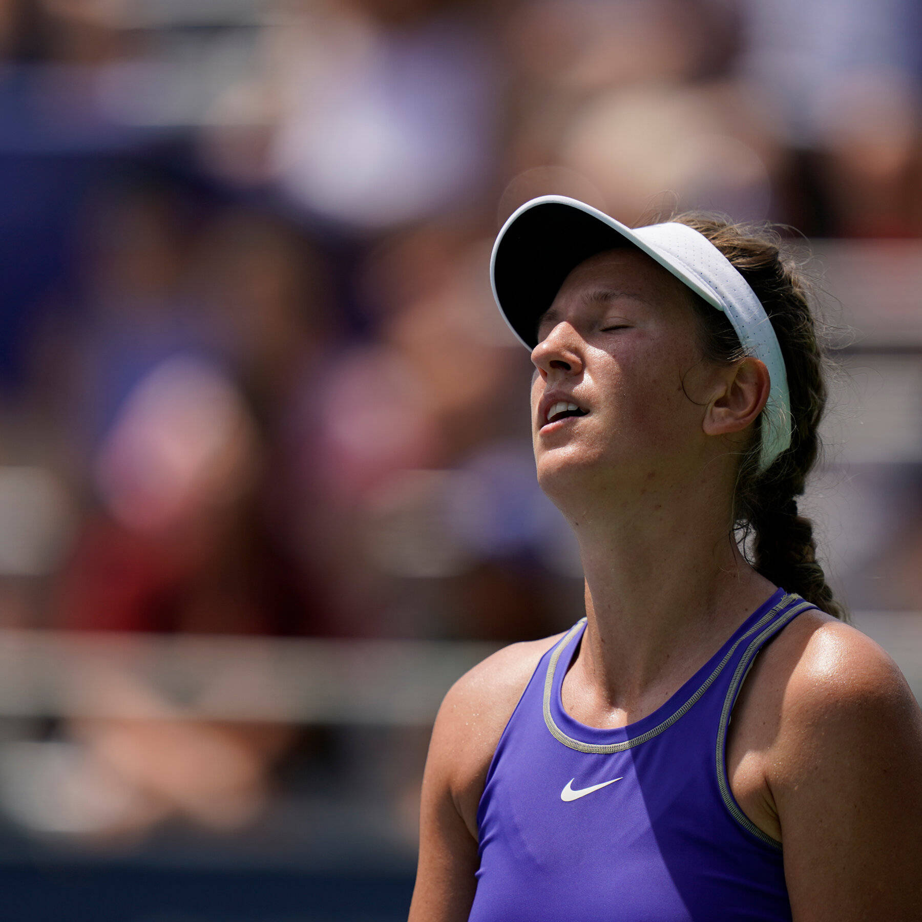 Victoria Azarenka In Purple Looking Up Background