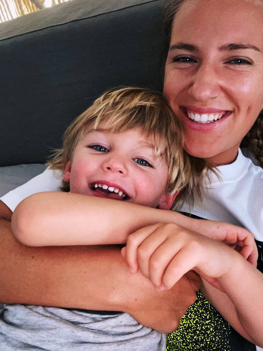 Victoria Azarenka Smiling With Her Son Background