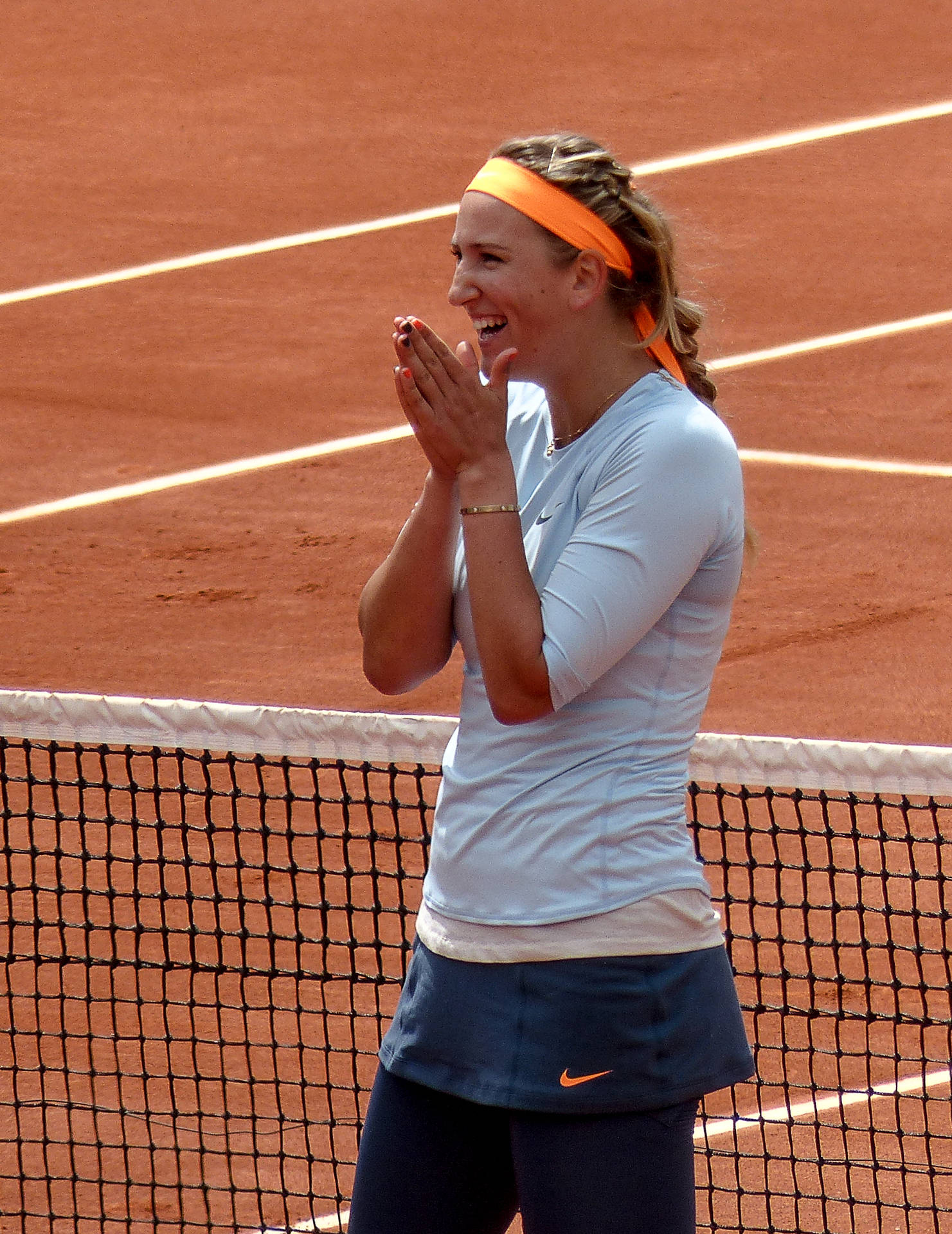 Victoria Azarenka With Her Hands Together Background