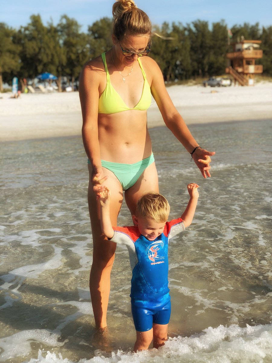 Victoria Azarenka With Son At Beach Background