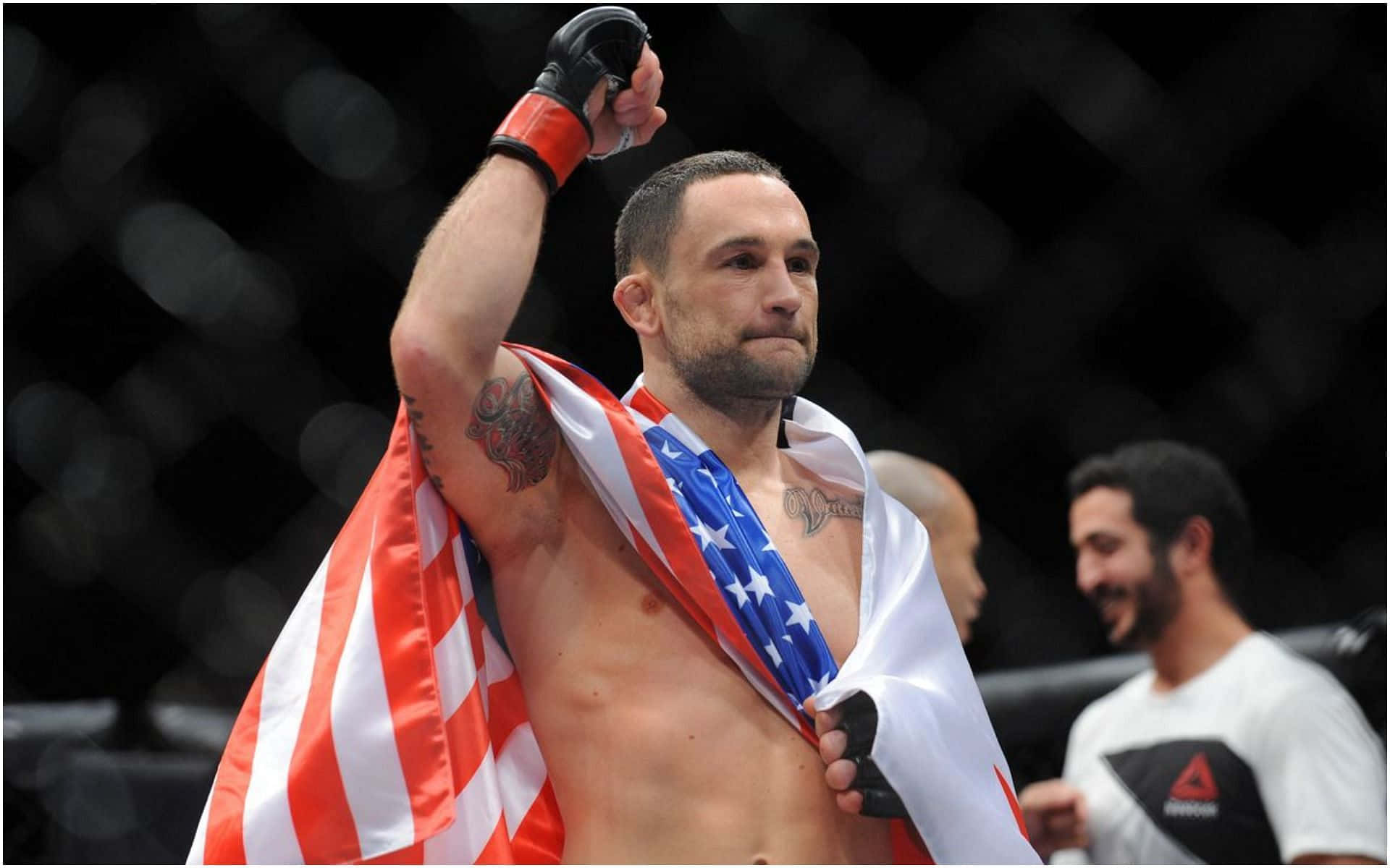 Victorious American Ufc Fighter Frankie Edgar Tuf Finale Event Background