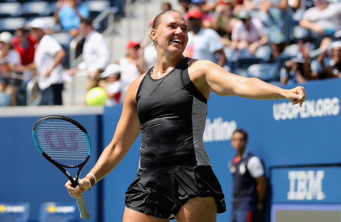 Victorious Kaia Kanepi Celebrating On The Tennis Court Background