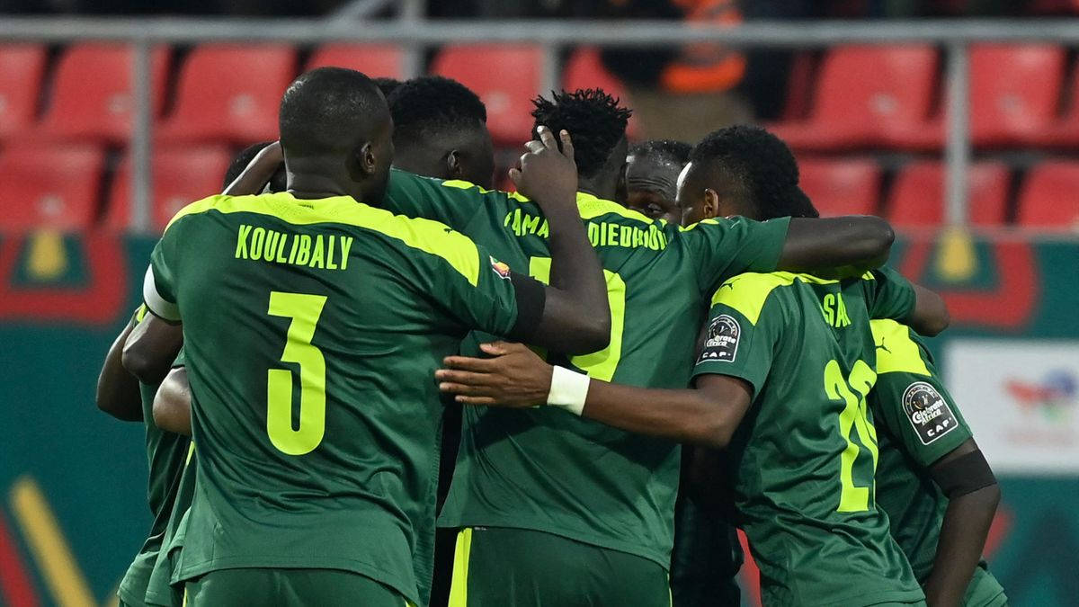 Victorious Senegal National Football Team Celebrating At Africa Cup Background