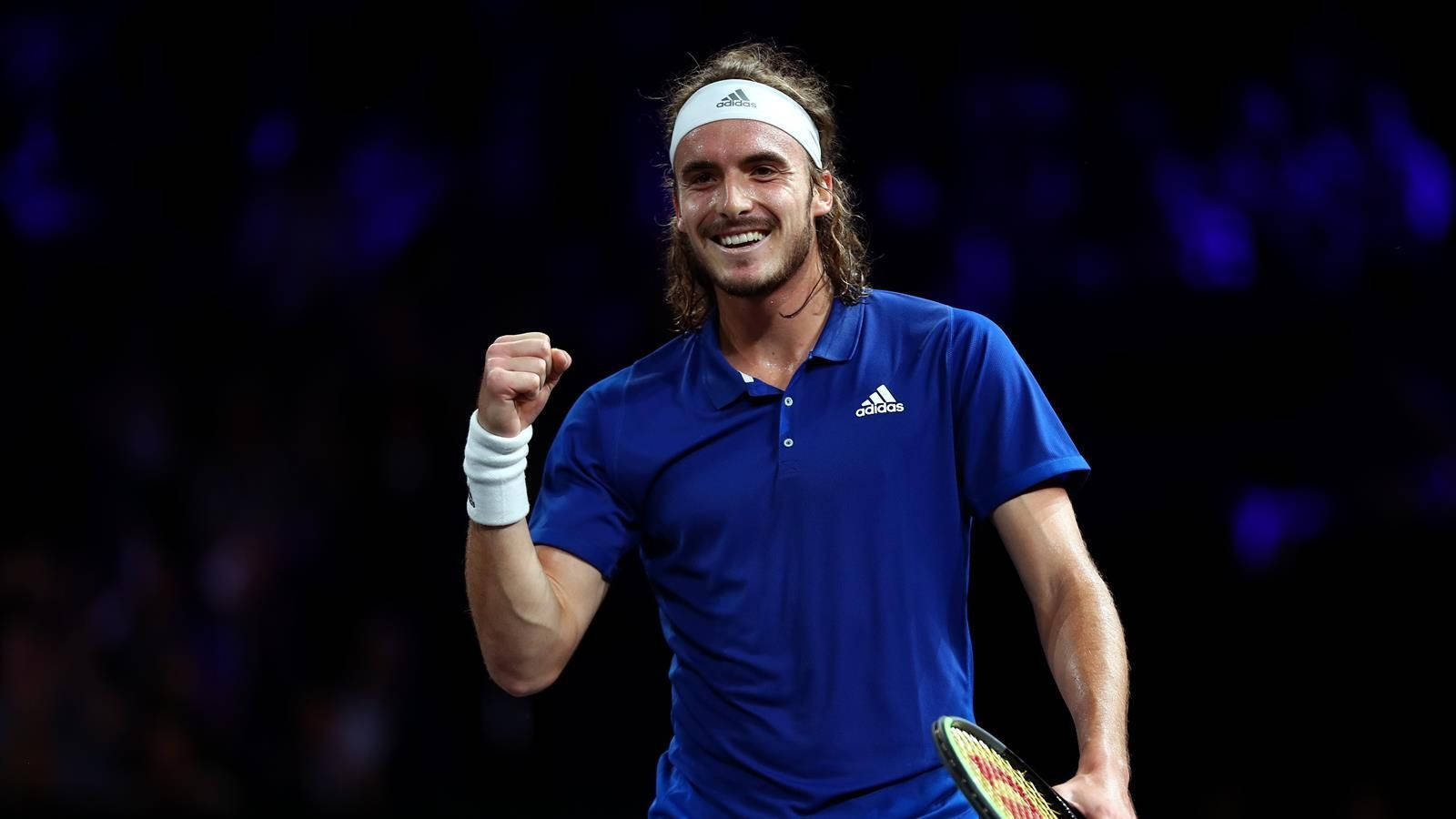 Victory Celebrations - A Jubilant Stefanos Tsitsipas Background