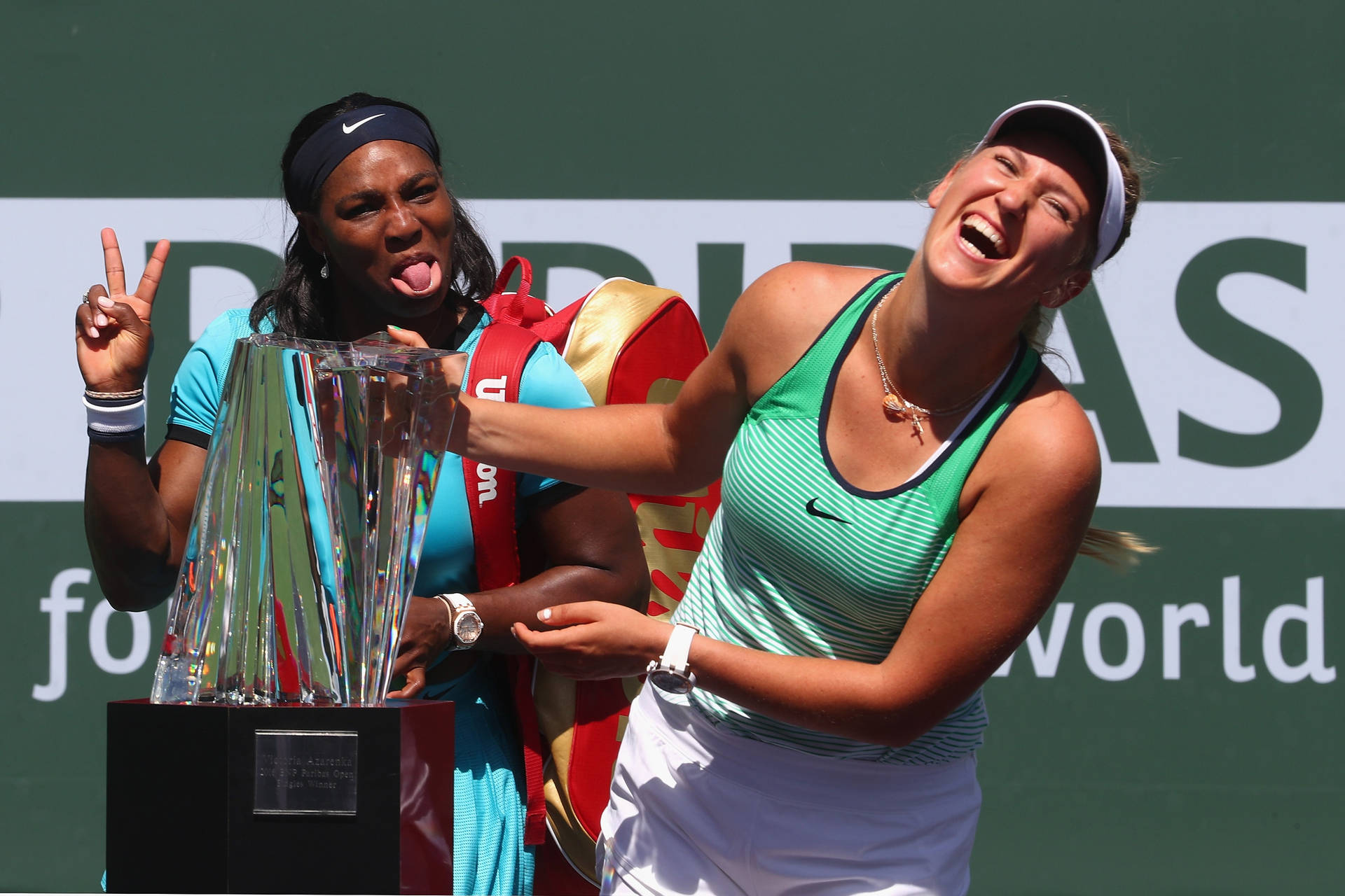 Victory Embrace - Victoria Azarenka And Fellow Player Celebrate Background