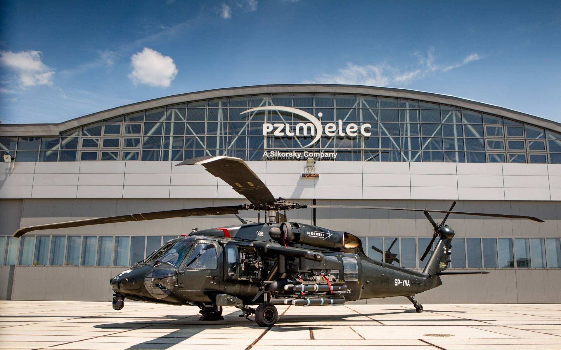 View Of A Black Hawk Helicopter In Flight Background