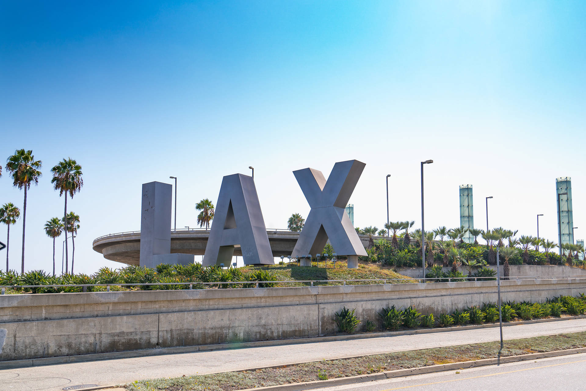 View Of Lax Signage Against A Clear Blue Sky