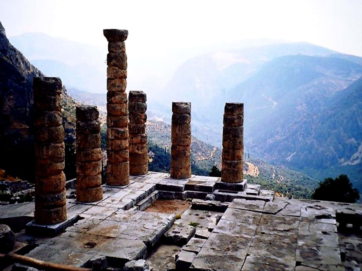 View Of The Mountains In Temple Of Apollo Background