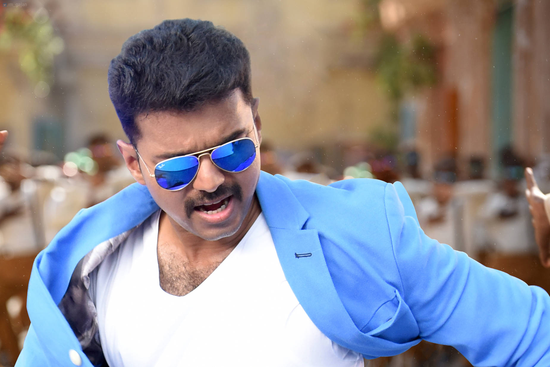 Vijay In Theri Movie Sporting Blue Sunglasses And Blazer Background