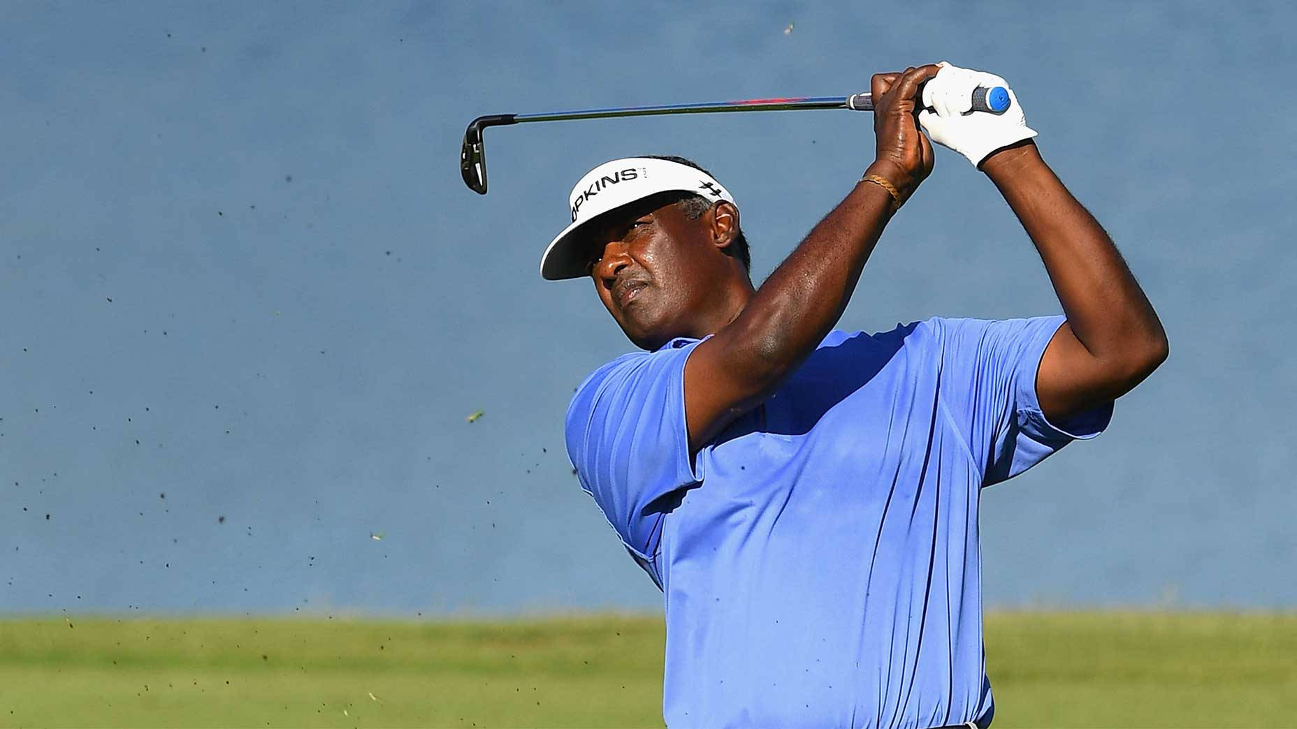 Vijay Singh Focused In The Greens Background