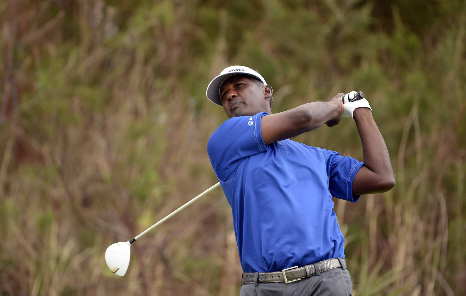 Vijay Singh In Blue Shirt Background