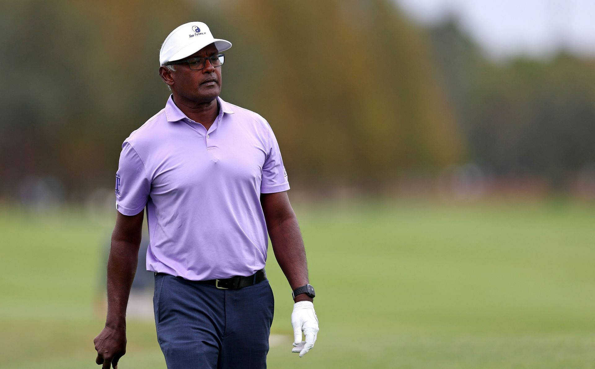 Vijay Singh In Purple Shirt Background