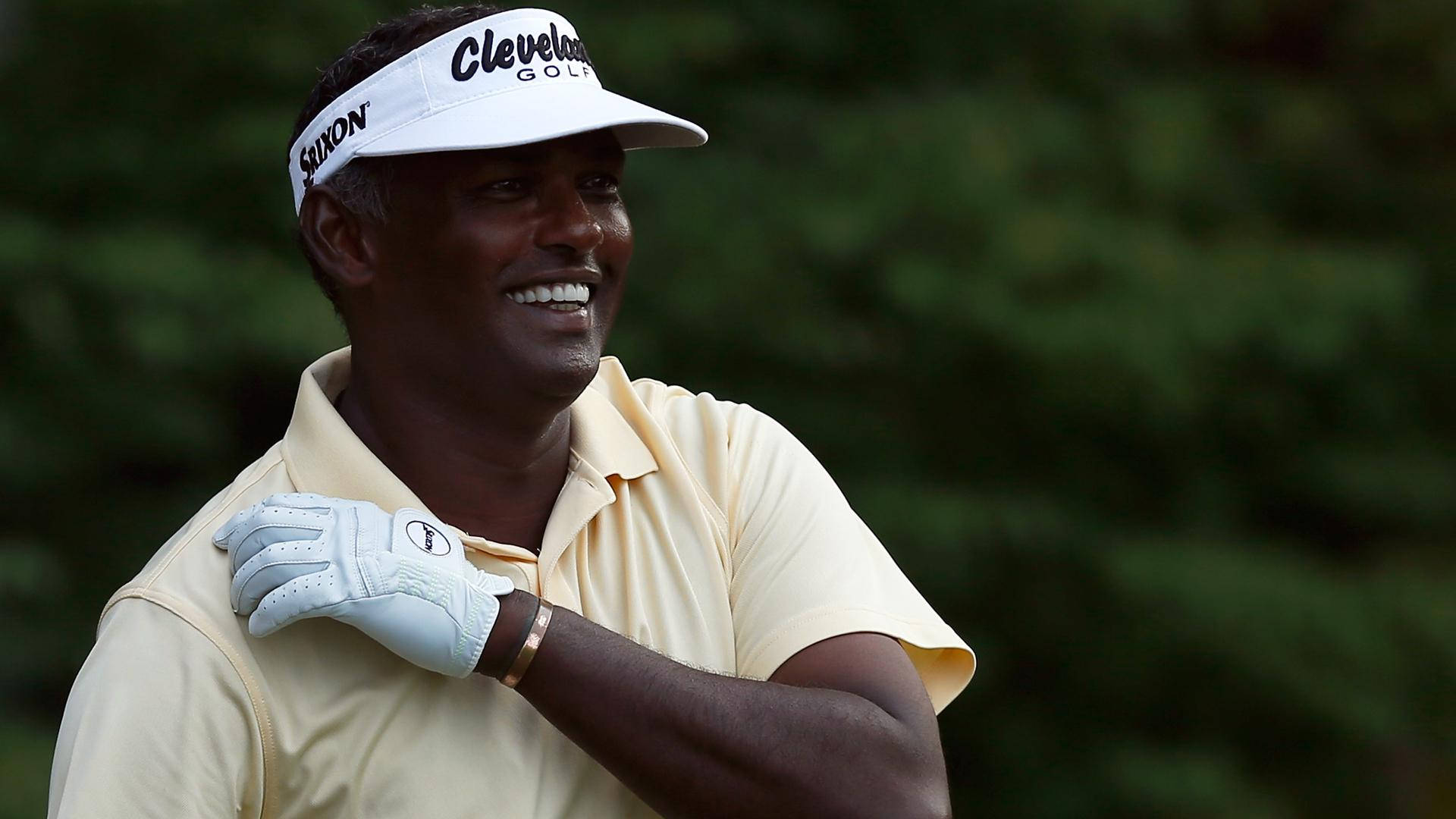 Vijay Singh In Yellow Shirt Background