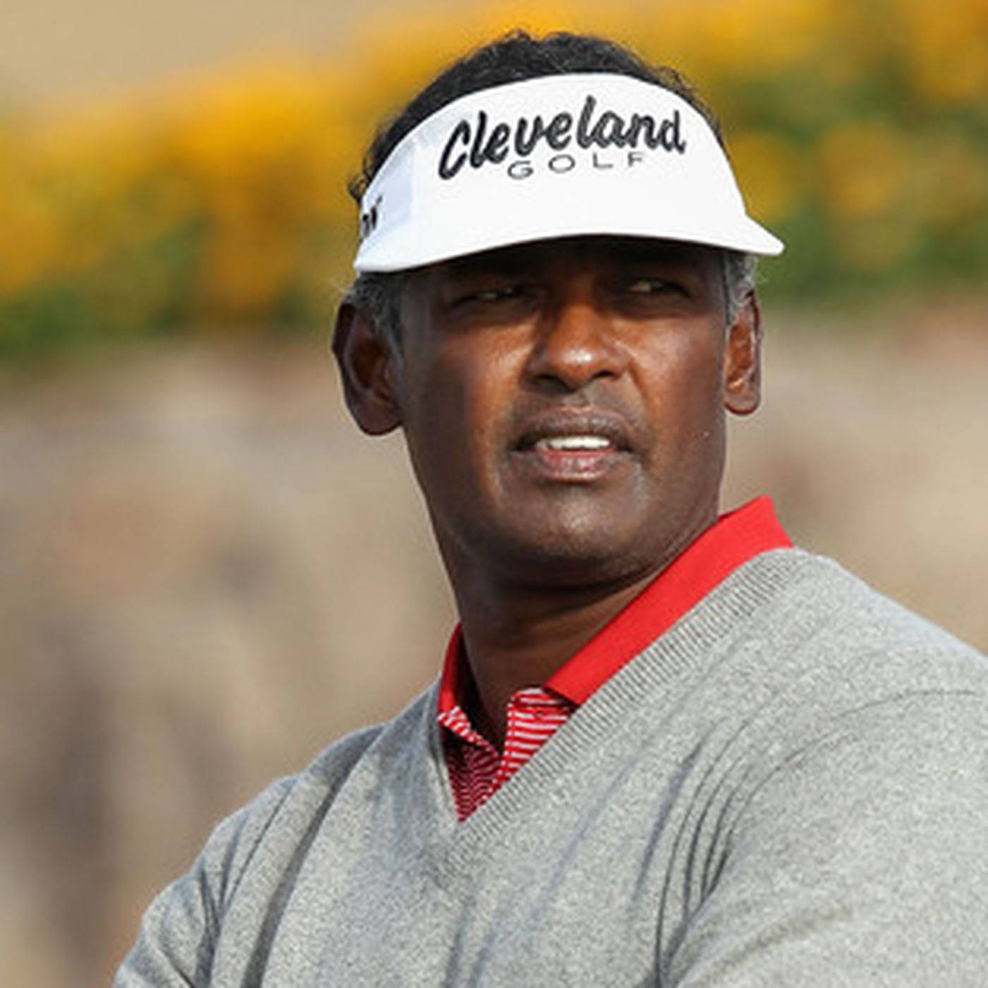 Vijay Singh Wearing A Cleveland Golf Cap Background