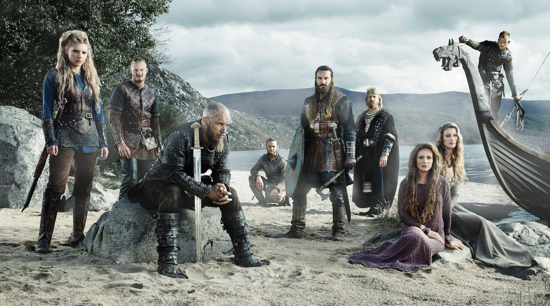 Vikings Lead Characters By The Shore Background