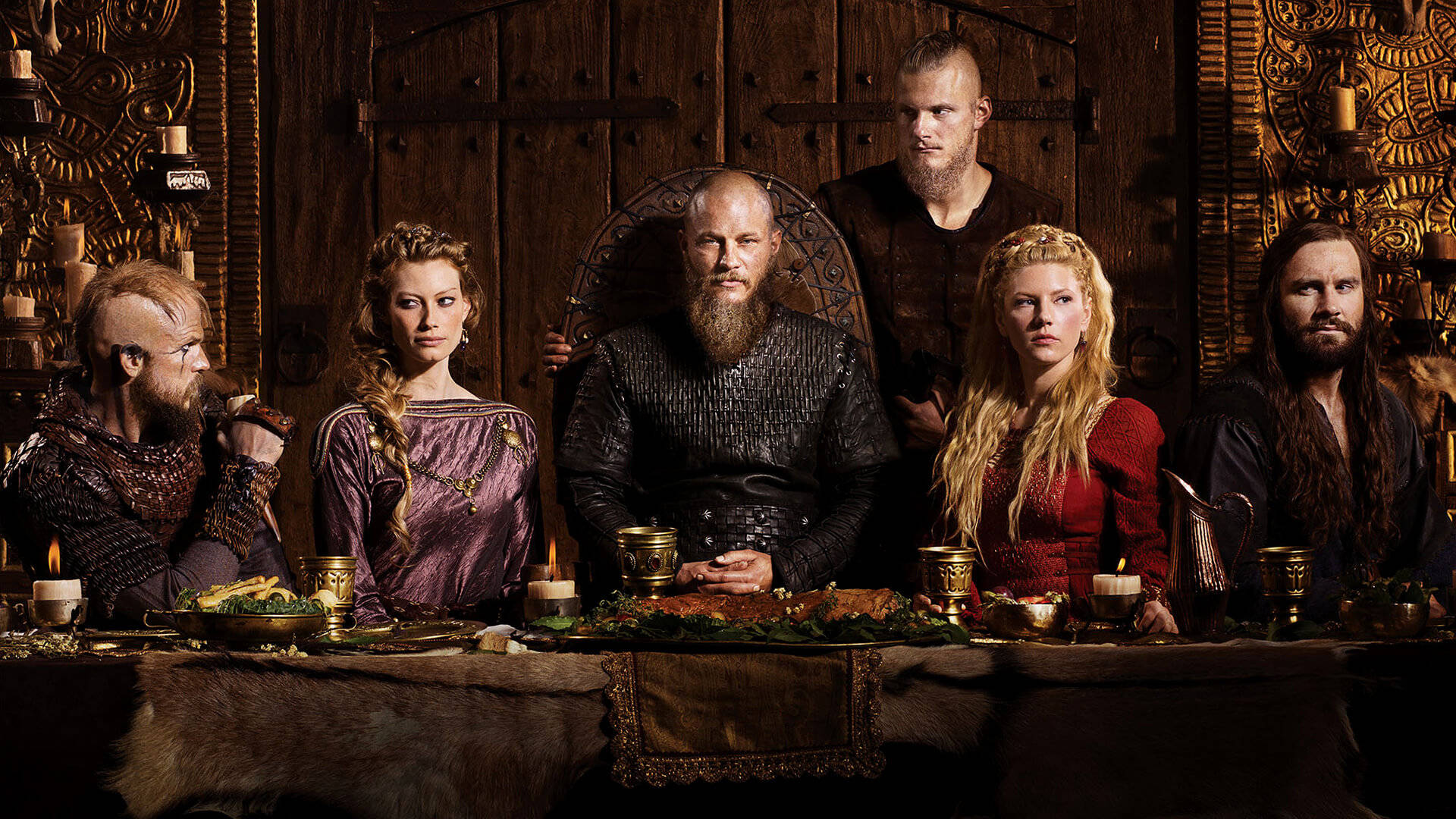 Vikings Posing In Front Of Table Background
