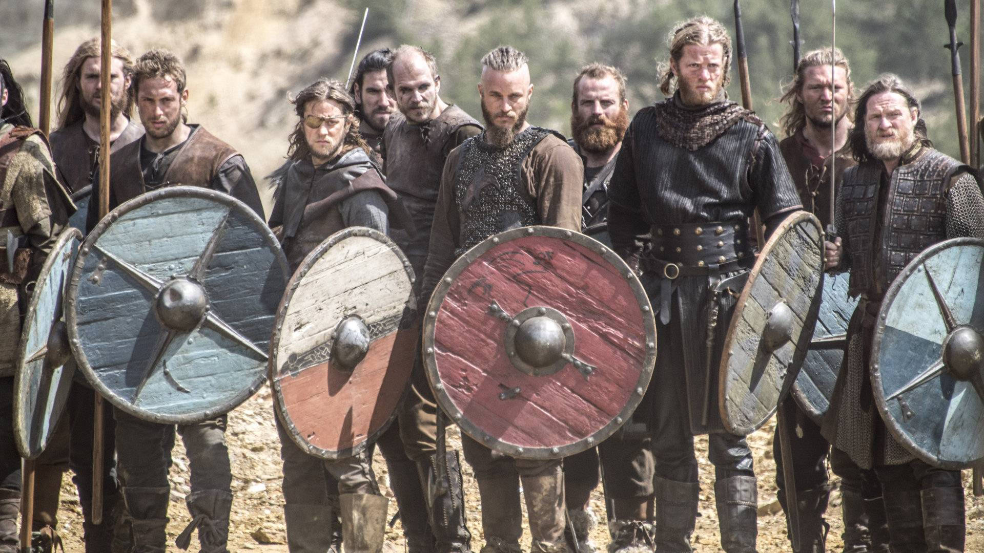 Vikings Posing With Weapons