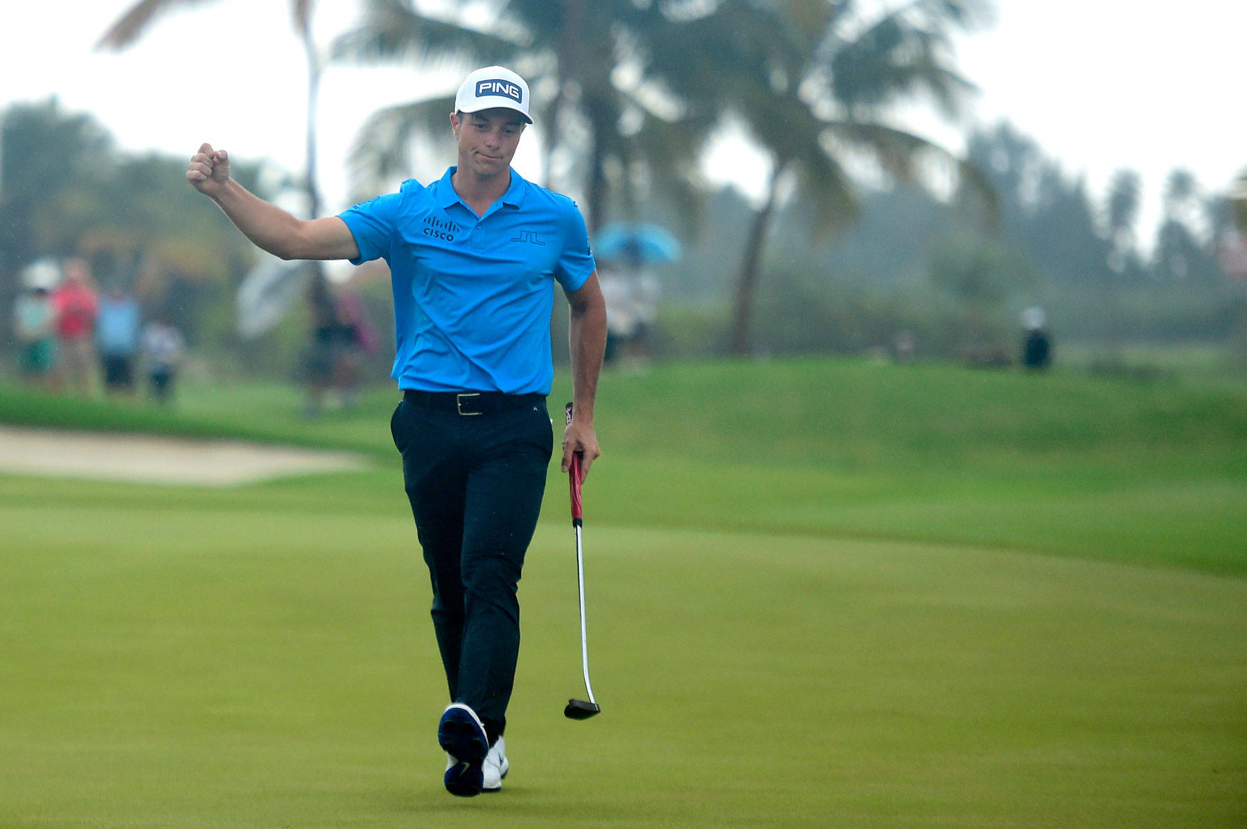 Viktor Hovland Doing A Winning Gesture Background