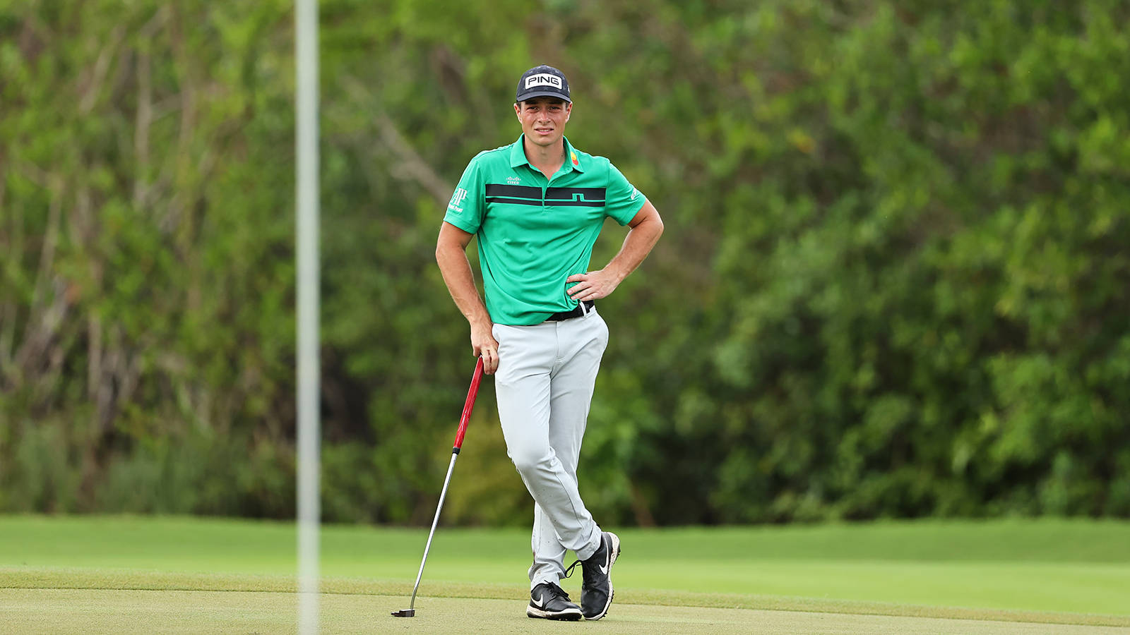 Viktor Hovland Standing Relaxedly Background