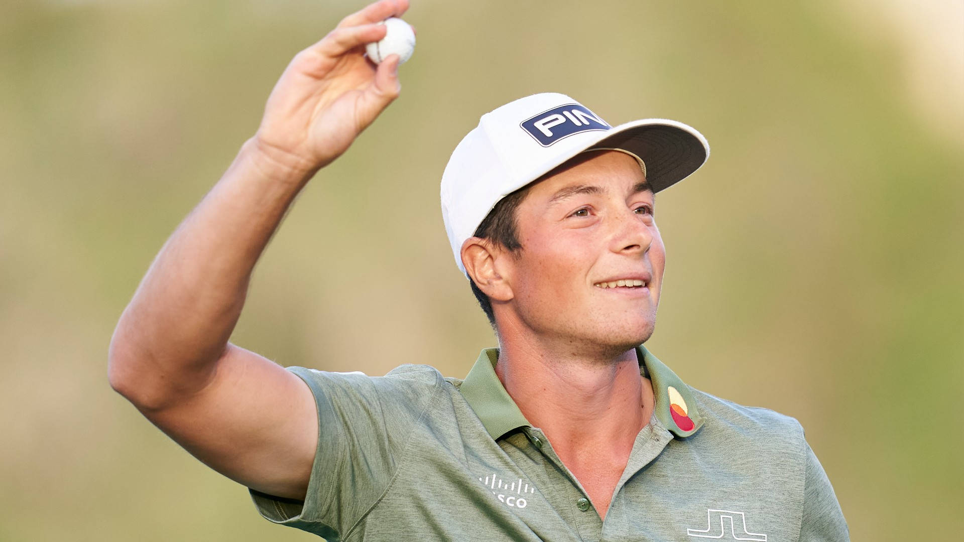 Viktor Hovland Throwing The Golf Ball