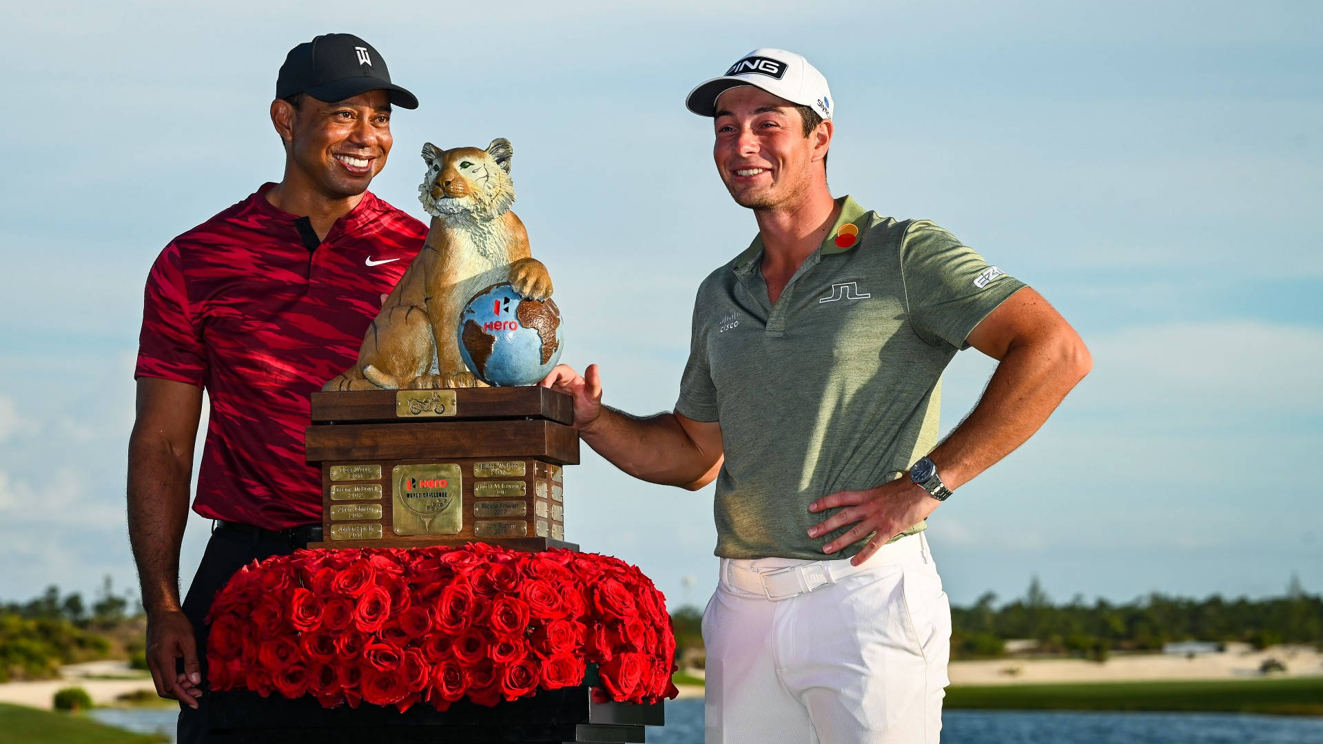 Viktor Hovland Winning A Tiger Trophy Background