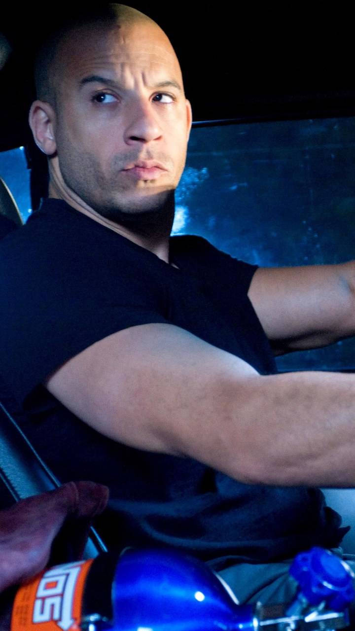 Vin Diesel In The Driver Seat Background
