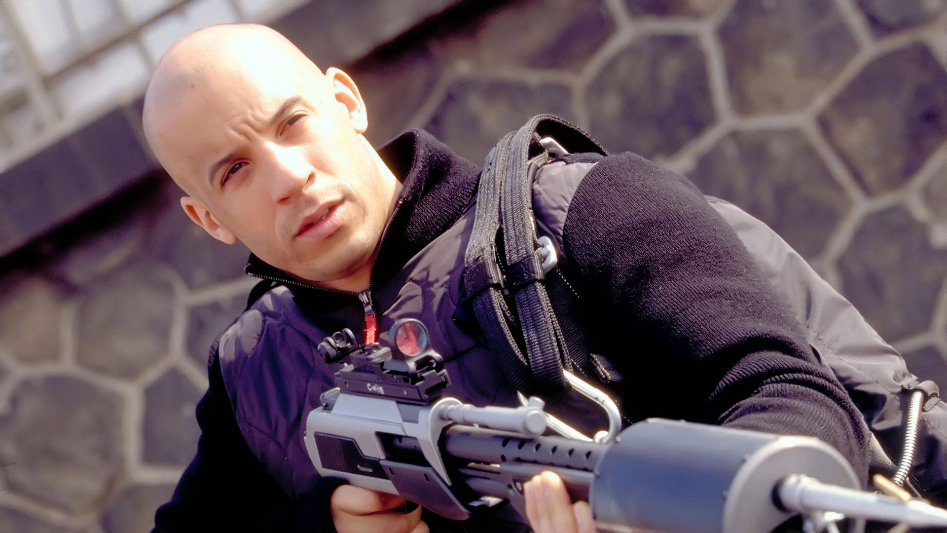 Vin Diesel With Rifle Background