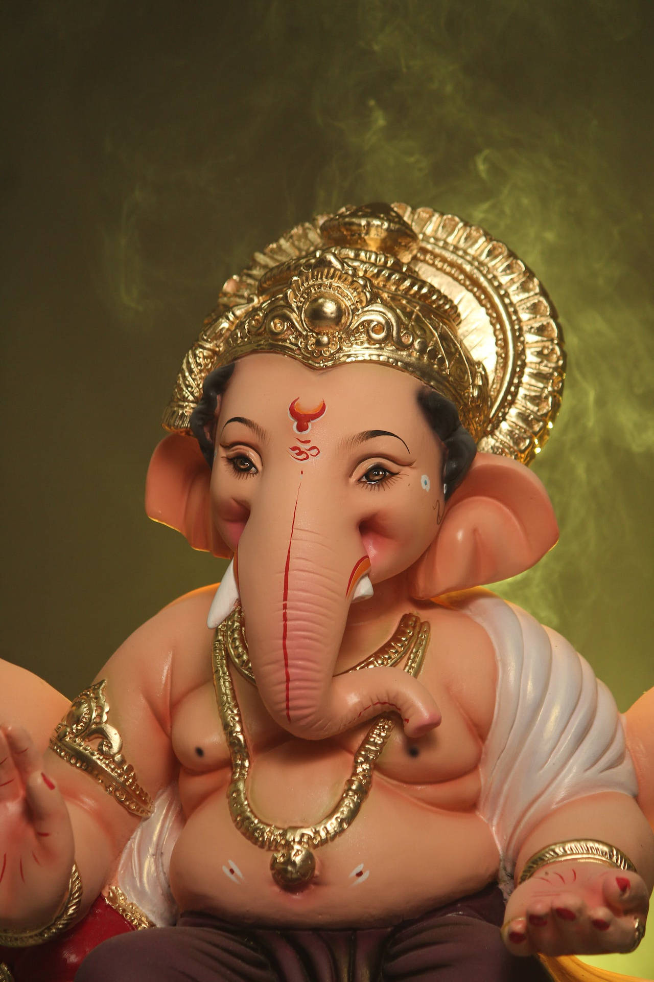 Vinayaka In White And Brown Clothes Background