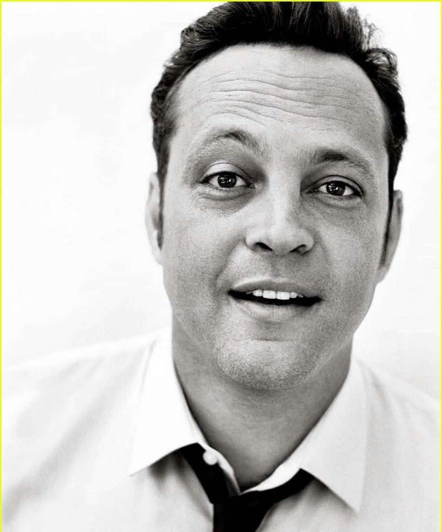 Vince Vaughn Looking Confident In A Formal Attire Background