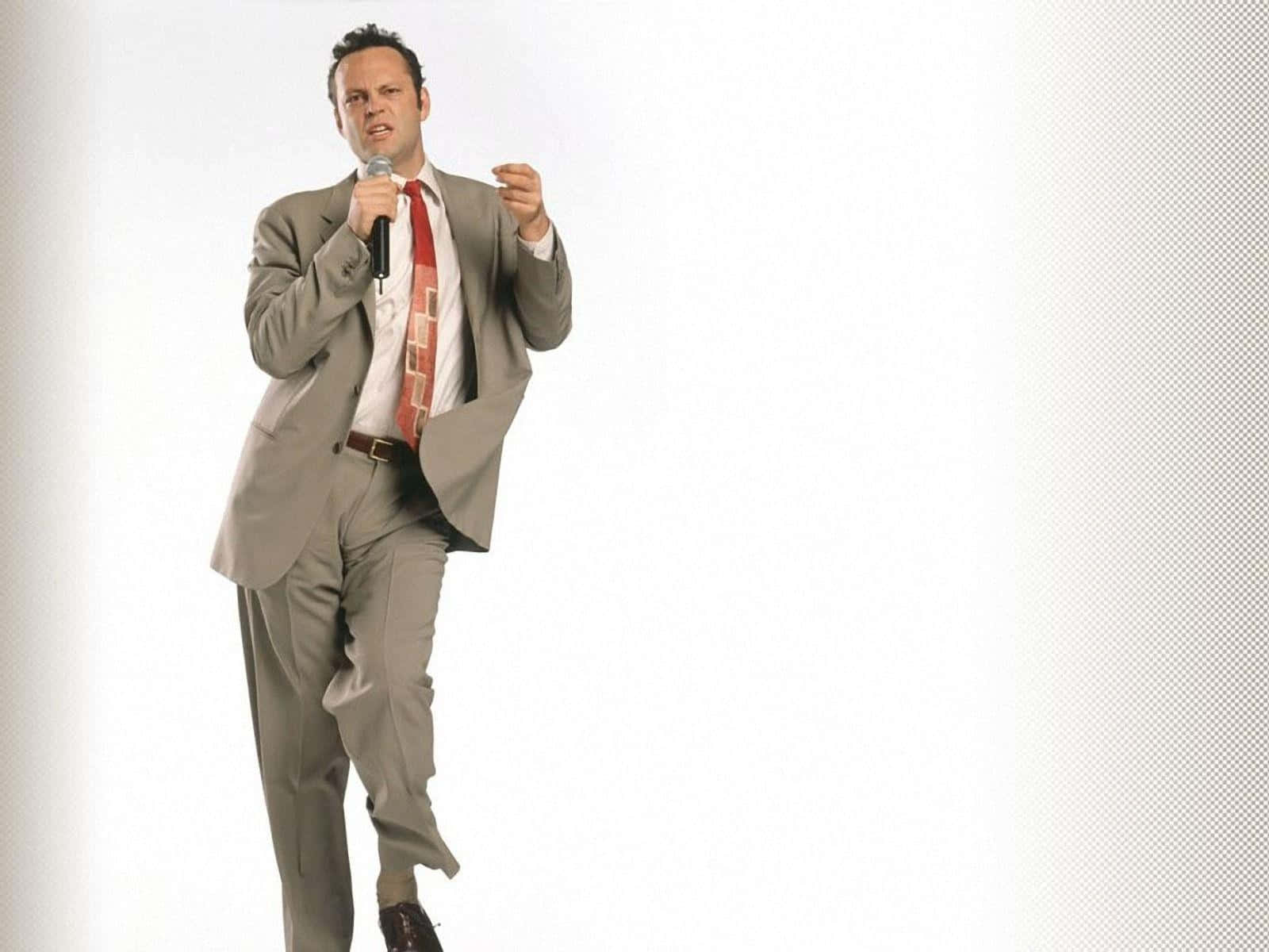 Vince Vaughn Striking A Confident Pose Background