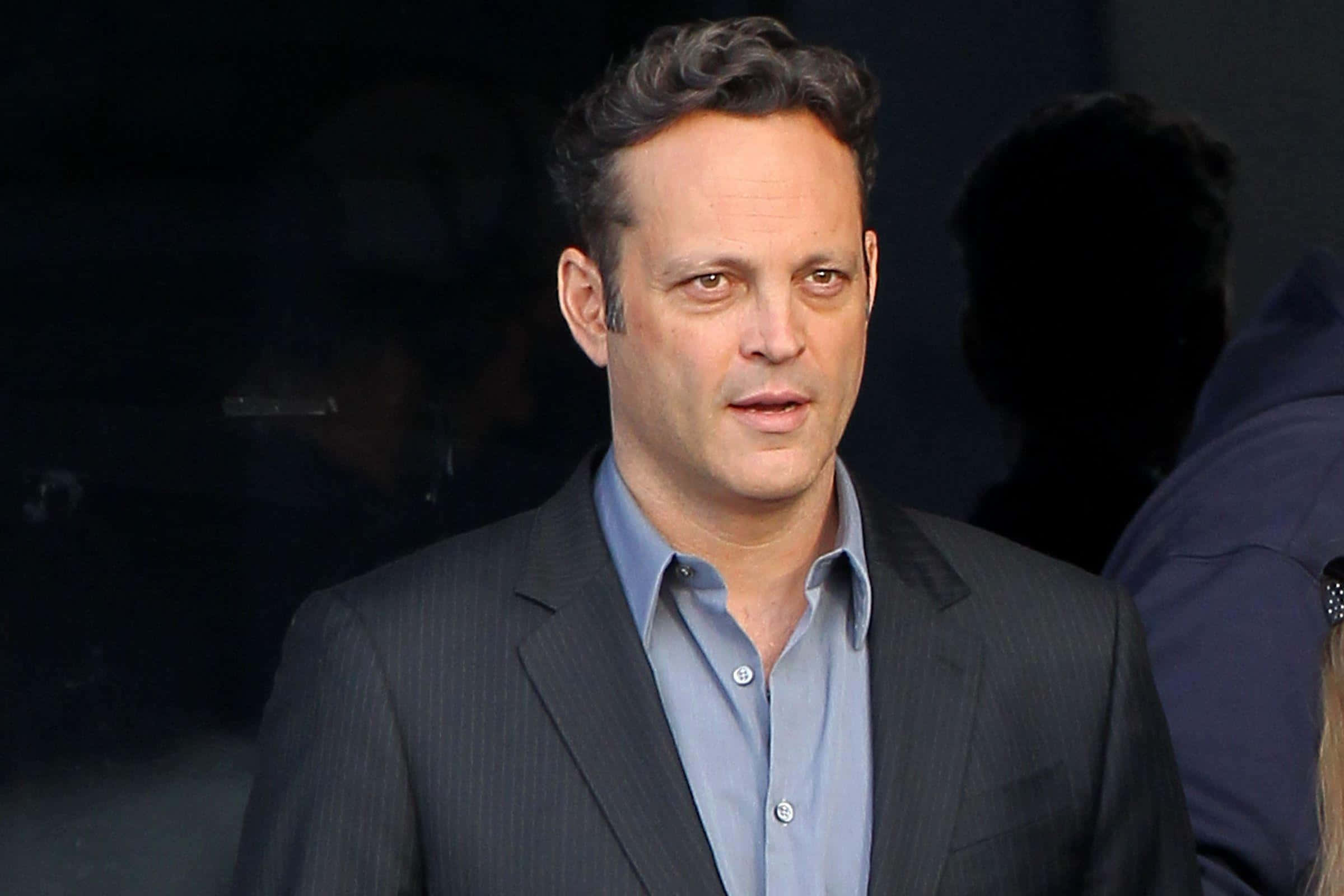 Vince Vaughn Striking A Confident Pose Background