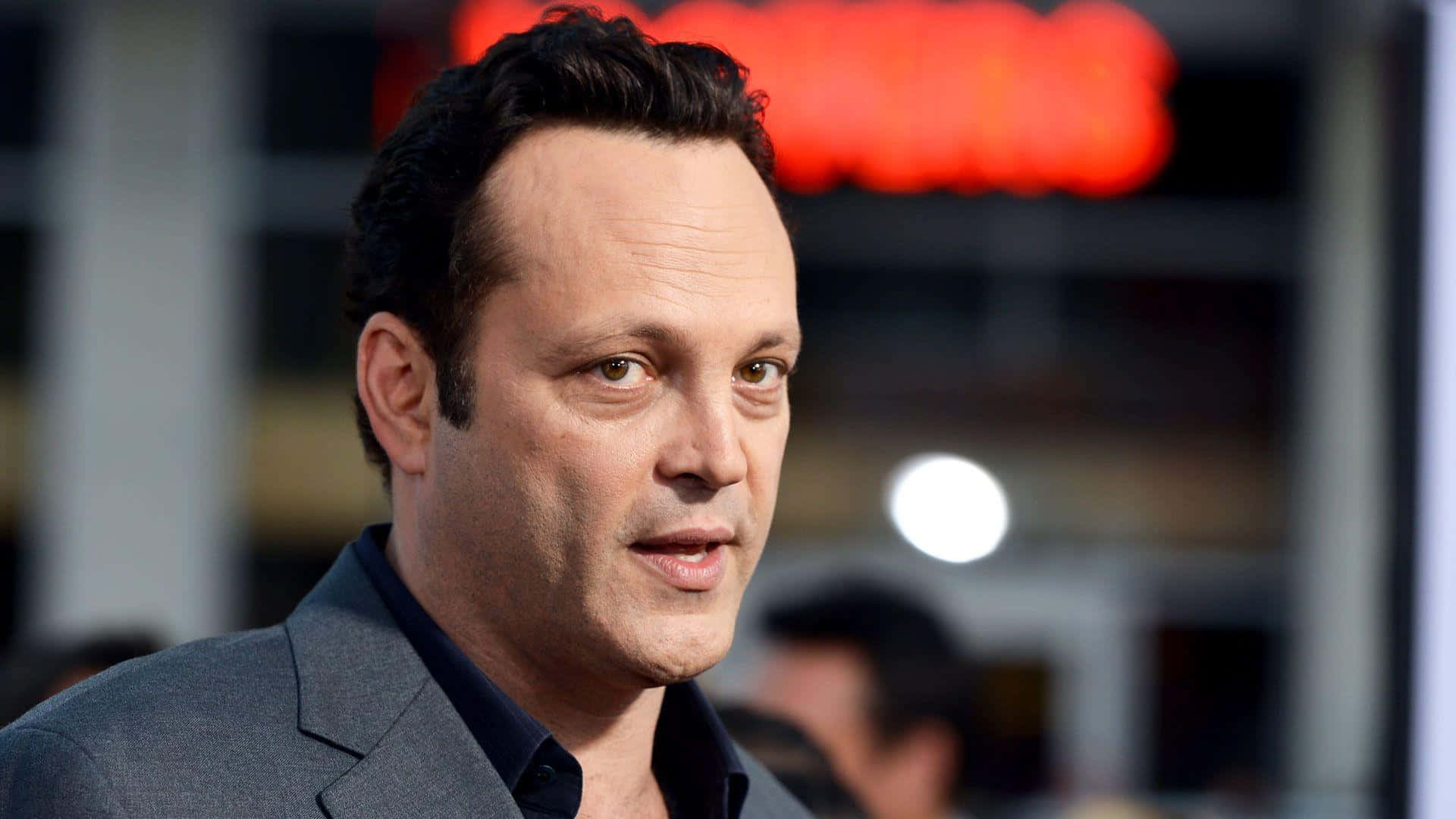 Vince Vaughn Striking A Pose For The Camera Background
