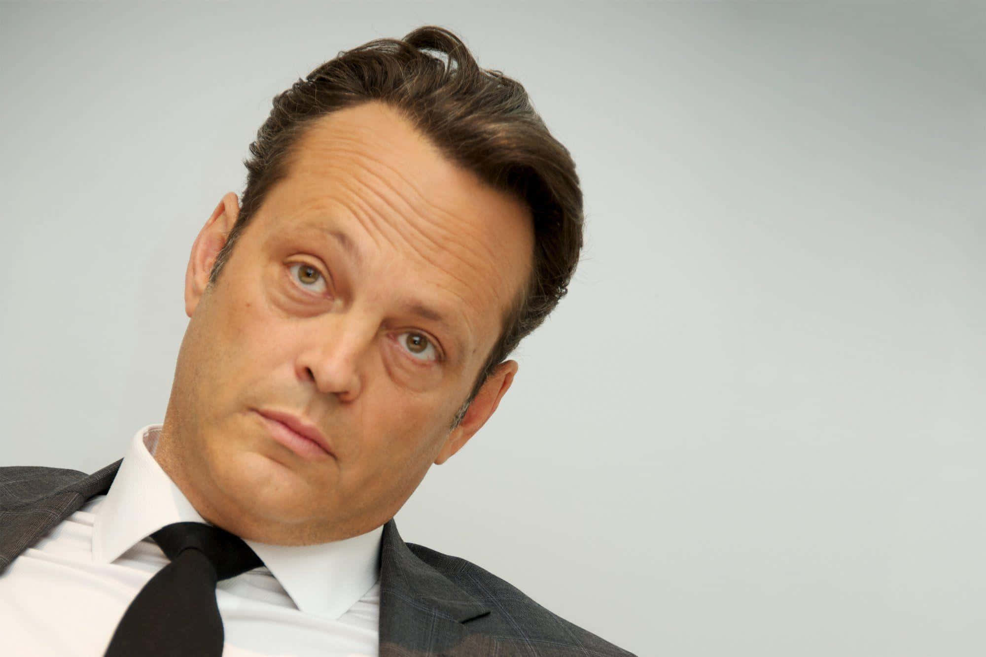 Vince Vaughn Striking A Pose Background